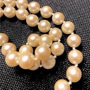 RARE! luminous, natural, 8mm pearl string knotted necklace. 25” length. Vintage.